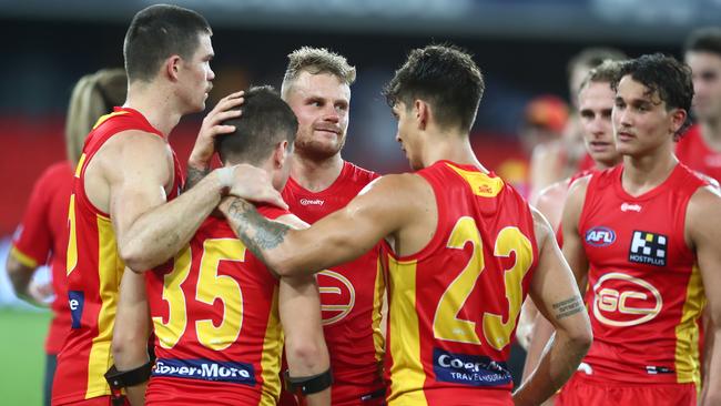 Gold Coast Suns players have arrived in Adelaide after their win over North Melbourne. Picture: Chris Hyde/Getty Images