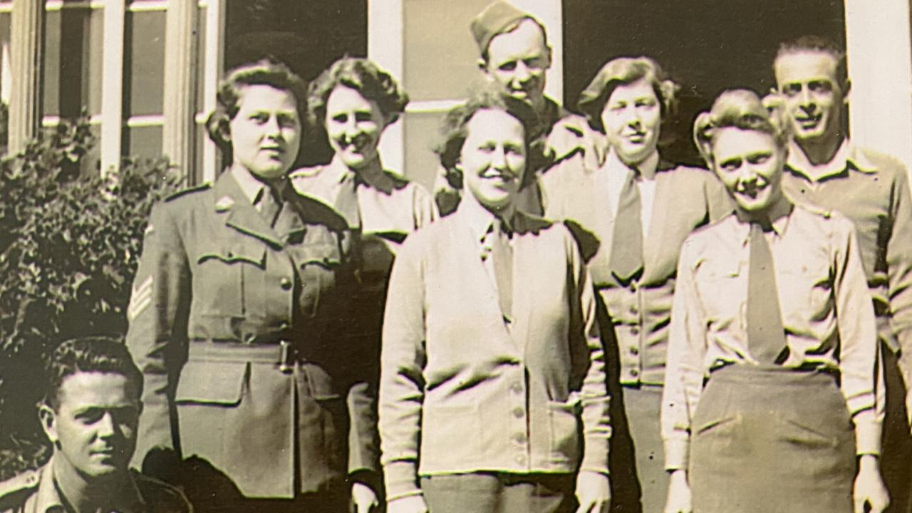 The Garage Girls and their drivers in 1944.