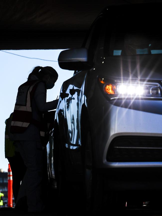 People drive through a tent outside Coors Field as they receive their second dose of the Pfizer-BioNTech COVID-19 vaccine in Denver, Colorado. Picture: Getty