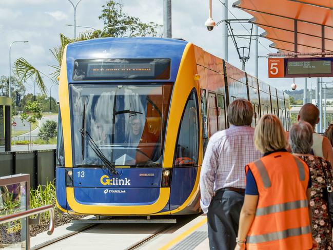 Opening morning of the Stage 2 of the Gold Coast light rail (g:link). The crowds wait as the light rail tram enters the station at Helensvale.  Picture: Jerad Williams