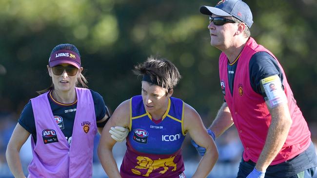 Sam Virgo is helped from the field against Melbourne. Picture: AAP Images 