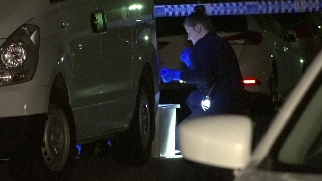 Forensic police at Aubrey Police, Granville. Picture: TNV