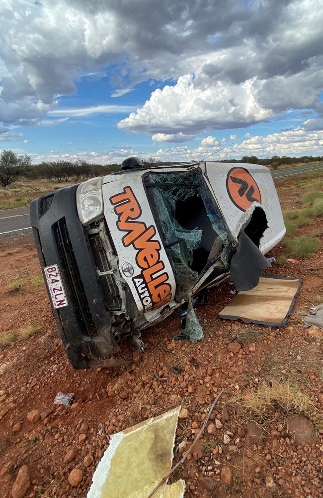 Two German tourists travelling in a hired HiAce van were injured in a single vehicle rollover 15km from Barrow Creek on the Stuart Hwy on Tuesday afternoon. Picture: PFES