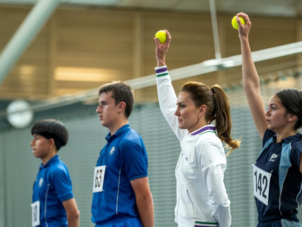 Catherine, Princess of Wales joins a ball boy and girl practice in the run up to Wimbledon. Picture: Thomas Lovelock - AELTC via Getty Images