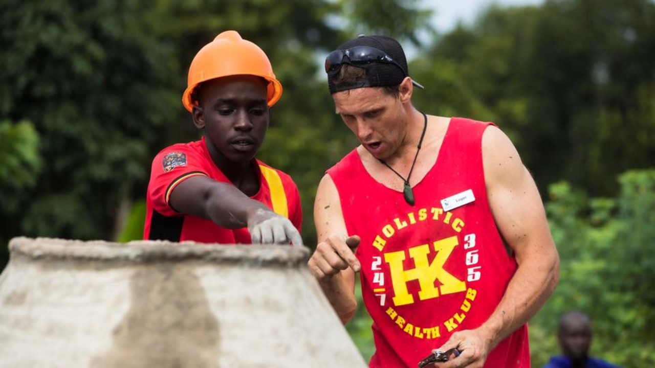 Coast builder Logan France, pictured with a labourer, said a reduction in JobSeeker payments could be the motivation some people needed to go back to work.