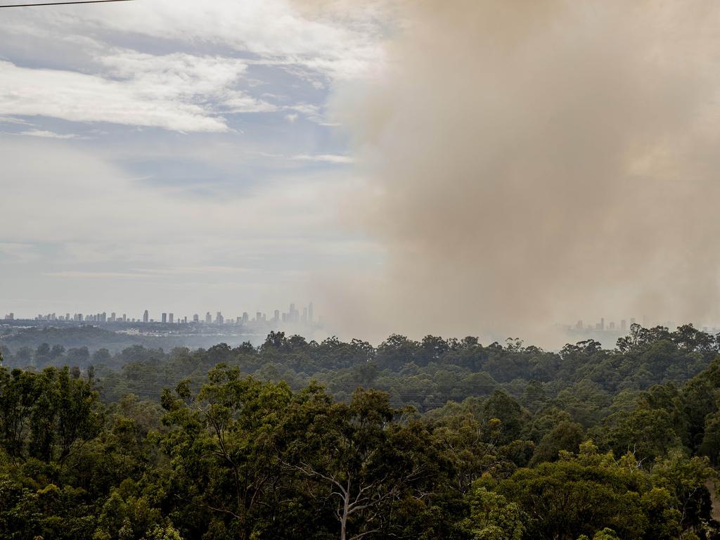 Smoke haze covers the Gold Coast Skyline from a grass fire at Carrara. Picture: Jerad Williams