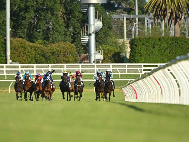 MELBOURNE, AUSTRALIA - DECEMBER 18: Daniel Moor riding Earth God (r) winning race 7, during Melbourne Racing at Caulfield Heath Racecourse on December 18, 2024 in Melbourne, Australia. (Photo by Vince Caligiuri/Getty Images)