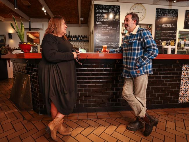 Pakula talks with local Karen Barber from King Valley Wine Tours over a beer at the Mountain View Hotel. Picture: David Caird