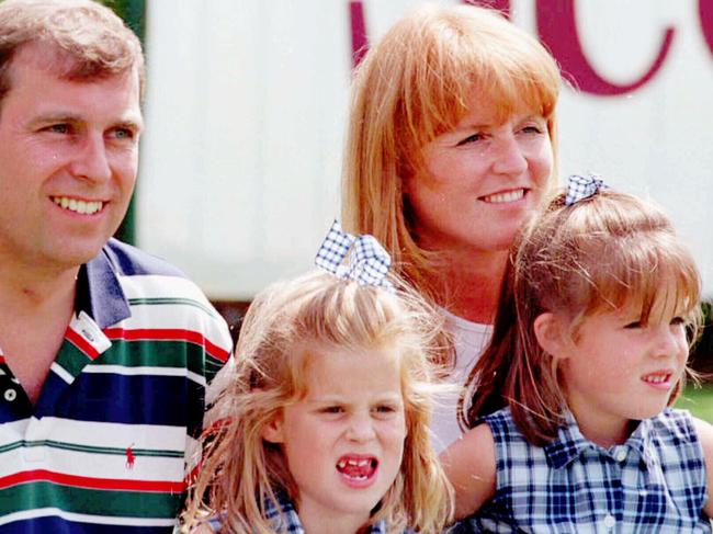 Prince Andrew with ex-wife Sarah Ferguson, Duchess of York and daughters Princess Eugenie and Princess Beatrice at Wentworth Golf Club in 1996.