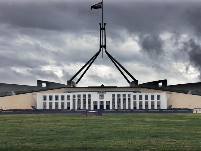 CANBERRA, AUSTRALIA NewsWire Photos - SEPTEMBER 20, 2021: COVID-19 and bad weather has kept most Canberrans inside as the ACT records 7 new cases. Storm clouds gather over Parliament House in Canberra.Picture: Newswire/Gary Ramage