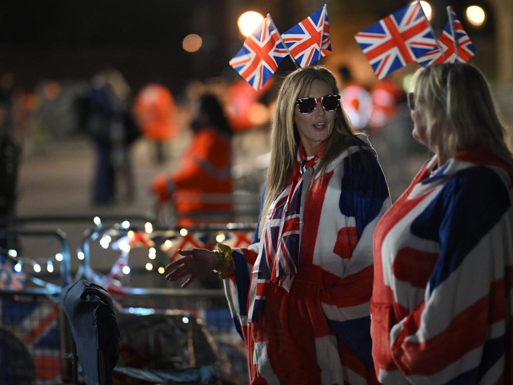 Royal fans camp out along the procession route on The Mall, near to Buckingham Palace in central London. Picture: AFP