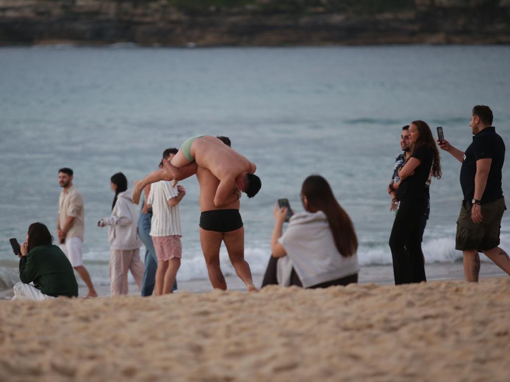 Bondi Beach was still full of revellers early on New Year’s Day. Picture: NewsWire / Christian Gilles