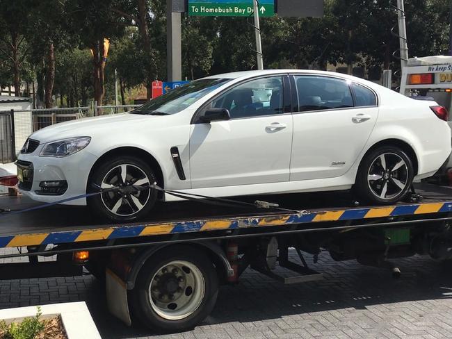 A white Commodore seized from Olympic Park by police investigating the murder of Pasquale Barbaro. Picture: Supplied