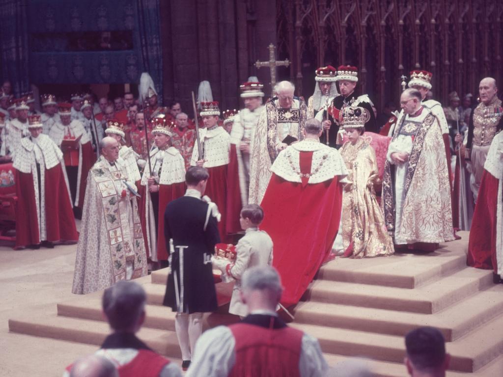 The Duke of Edinburgh was the first to pay homage to his wife, the newly crowned Queen, after the Archbishop of Canterbury, who led the near three-hour ceremony. Picture: Hulton Archive/Getty