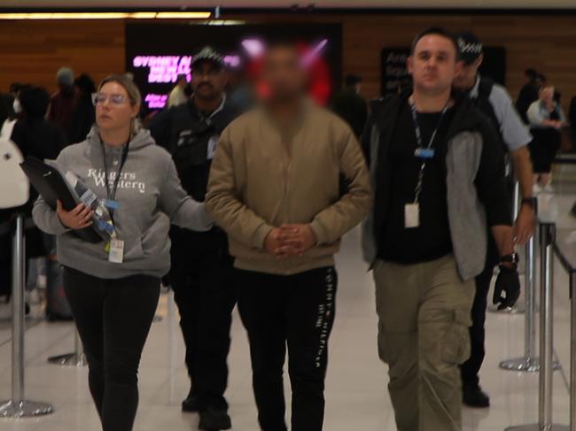 Strike Force investigators arrested a 37-year-old man at Sydney Airport over his alleged role in a $1.2m laundering syndicate. Picture: NSW Police.