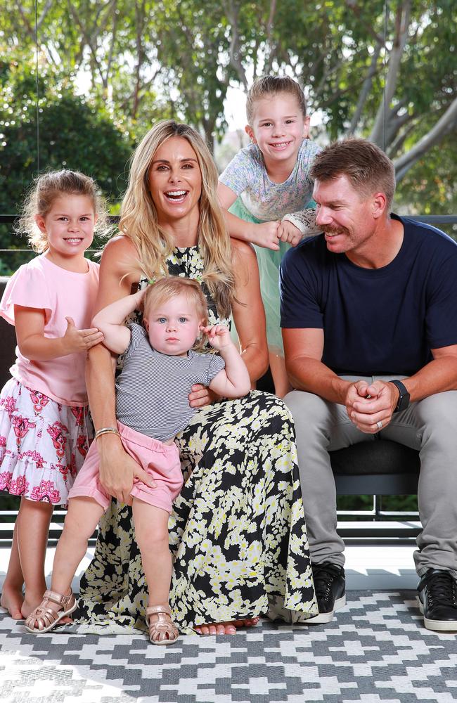 David and Candice Warner at home with their daughters, Indi, 5, Isla, 1, and Ivy, 6. Picture: Justin Lloyd.