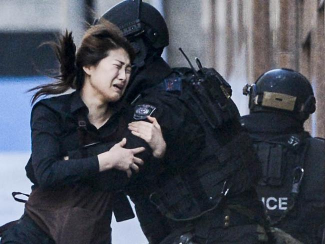 Police attend a siege in the Lindt shop in Sydney's Martin Place. Picture: Chris McKeen