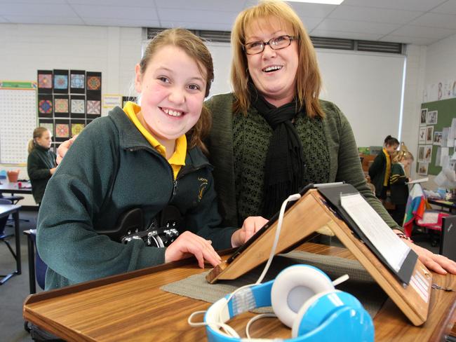 Pride of Australia nominee and Teacher assistant, Deb Langiano (right) with Blackmans Bay Primary School grade 4 student, Jade Heinstman, 10.