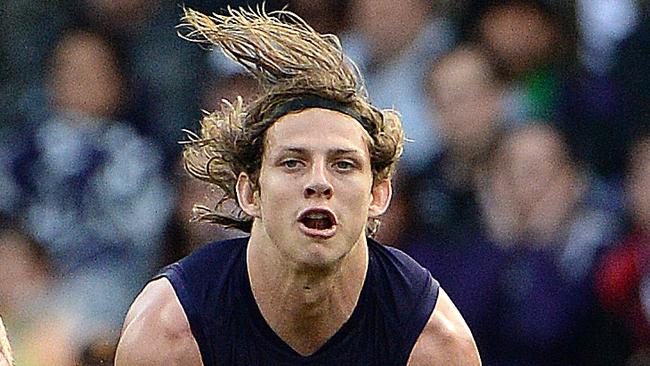 SPORT - AFL Round 14 Fremantle Dockers v Brisbane Lions, Domain Stadium, Perth. Photo by Daniel Wilkins. PICTURED - Fremantle's Nathan Fyfe marks in front of Brisbane's Daniel Rich