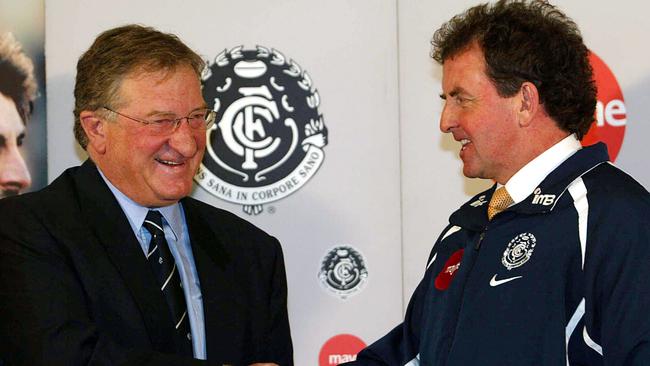 Denis Pagan is welcomed by John Elliott after taking over as Carlton coach.