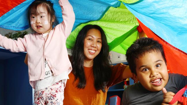 Early Years Special Education teacher Diana Backhouse with Shion 4, and Harrison 5 at Nursery Road State Special School at Holland Park. Picture Lachie Millard