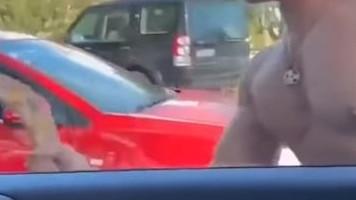 The man was brandishing a wooden boomerang. Picture: 9NEWS