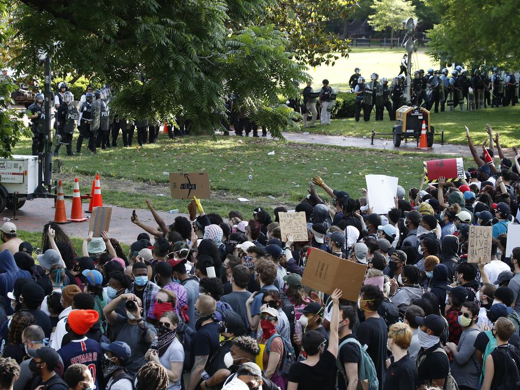 Demonstrators gather at Lafayette Park near the White House in Washington. Picture: AP