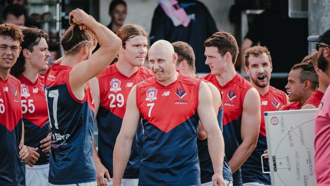 Surfers Paradise star Brodie Haberfield (centre) with his teammates. Picture: Brooke Sleep Media