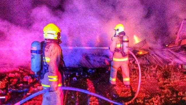 Firefighters from Fire and Rescue NSW and other crews fighting a large fire in Vineyard. Picture: Riverstone Fire &amp; Rescue