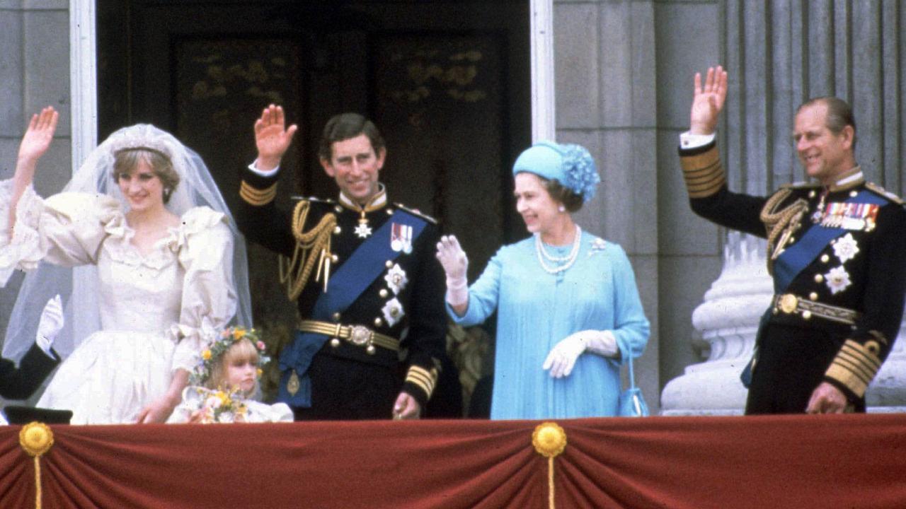 Prince Philip and the Queen waving at fans alongside the newly married Diana and Prince Charles in 1981. 