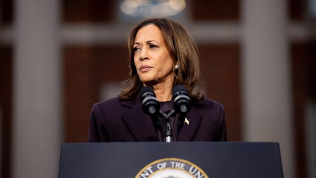 Vice President Kamala Harris pauses while speaking on stage as she concedes the election at Howard University.