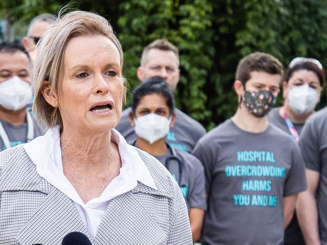 SASMOA Chief Industrial Officer Bernadette Mulholland speaks to the media with doctors at the Royal Adelaide Hospital ED wearing t-shirts today as part of a campaign to highlight significant problems in their ED and across our hospitals, on July 4th, 2022, at the Royal Adelaide Hospital. Picture: Tom Huntley