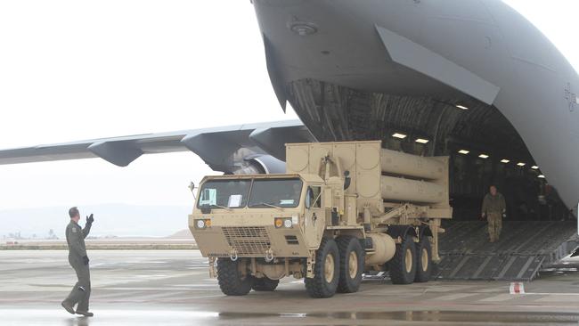 A US Air Force Airmen offloads a THAAD launcher from a C-17 Globe Master III at Nevatim Air Base, Israel. Picture: "AFP PHOTO / HANDOUT / DVIDS / US ARMY / Captain Robert DURR