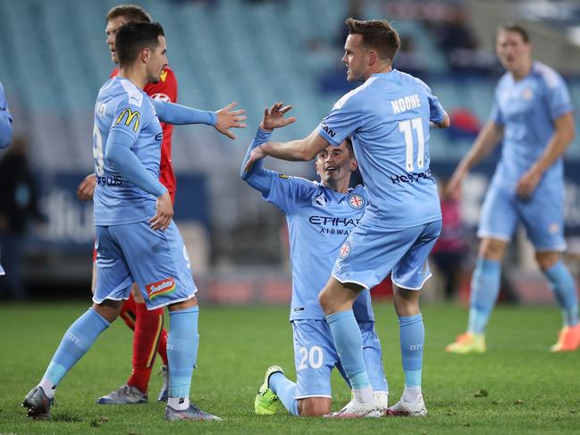 SYDNEY, AUSTRALIA - AUGUST 11: Adrian Luna of Melbourne City celebrates with Jamie Maclaren and Craig Noone of Melbourne City after scoring a goal during the round 25 A-League match between Melbourne City and Adelaide United at ANZ Stadium on August 11, 2020 in Sydney, Australia. (Photo by Mark Kolbe/Getty Images)