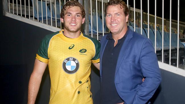 Former Wallaby Sam Scott-Young with his son Angus.