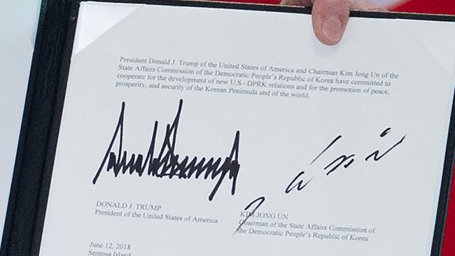 The signatures of US President Donald Trump, elft and North Korea's leader Kim Jong-un. Picture: AFP