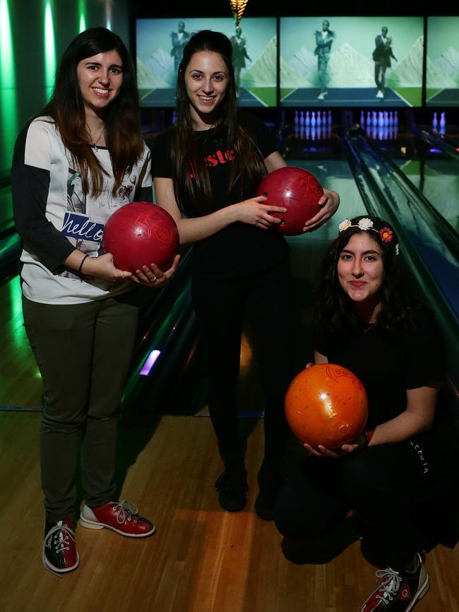 Pictured at Kingpin Bowling in Norwood are Ioanna Mavrotsoupakis 19, Monique Cirocco, 16, and Ioanna's sister Eleni Mavrotsoupakis, 15. The review does suggest that there could be exemptions for venues where their core business was entertainment aimed mainly at people under the age of 18 years, which the Government said could include bowling alleys.