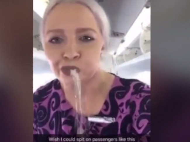 A Snapchat video of a hostess pretending to spit water on passengers during a flight. Picture: Taken from NZ Herald