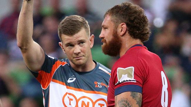 Scott Higginbotham of the Reds is shown a red card during the round 2 Super Rugby match between the Melbourne Rebels and the Queensland Reds at AAMI Park in Melbourne, Friday, February 23, 2018. (AAP Image/Hamish Blair) NO ARCHIVING, EDITORIAL USE ONLY