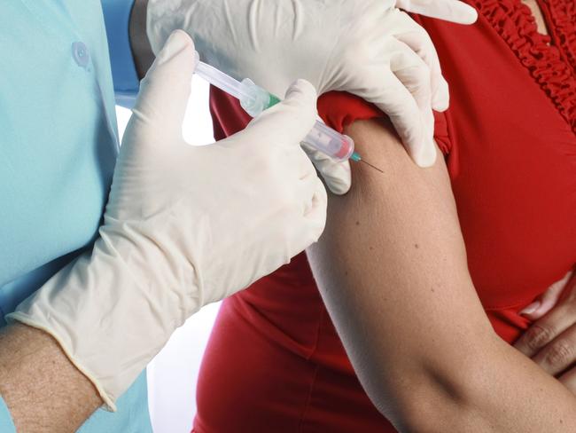 Generic photo of a person getting a flu shot. vaccination / needle / doctor / patient.   Picture: iStock