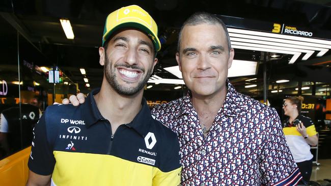 Robbie Williams and Daniel Ricciardo a day before the event was cancelled in 2020. Picture: David Caird