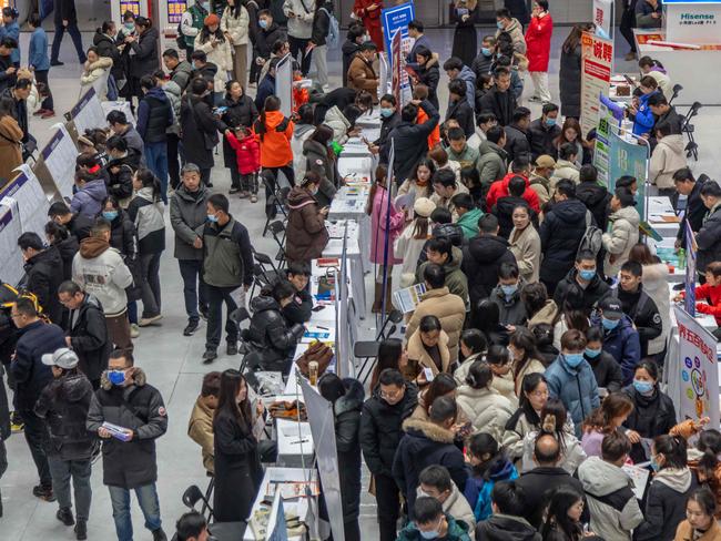 People attend a job fair in Zhengzhou, in central China's Henan province on February 19. Picture: AFP