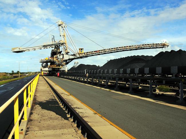 A coal spreader distributes coal at Dalrymple Bay Coal Terminal Pty facilities at Mackay harbor in Queensland, Australia, on Wednesday, May 28, 2008. Australian exports rose to a record in May as prices for iron ore and coal surged, suggesting overseas shipments will underpin economic growth this year. Photographer: Eric Taylor/Bloomberg News