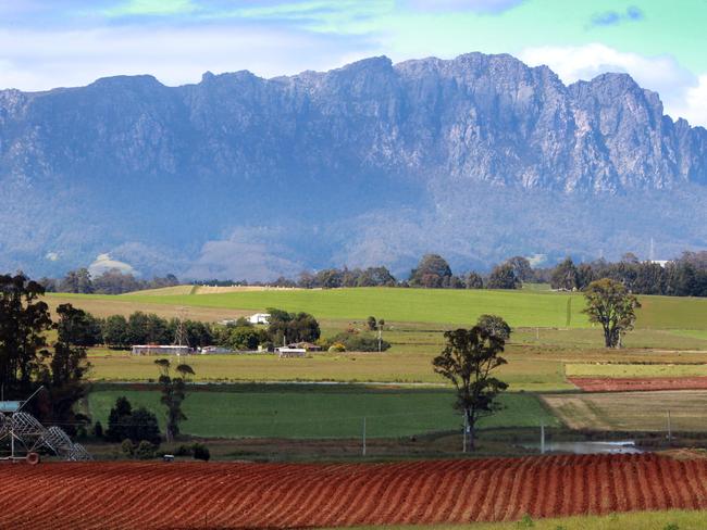 Saturday Magazine Tassie Towns, historical, the mural town of Sheffield, a town situated 23 kilometres inland from Devonport on the north-west coast of Tasmania, scenic view of Mt (Mount) Roland and farmland