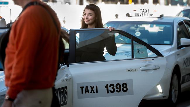 Tamsin Rose getting into a taxi at Melbourne airport. Picture: Jay Town