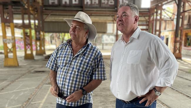 BM Webb head Brad Webb inspects the North Rail Yards project with the then-Townsville MP Scott Stewart. Picture: Chris Burns.