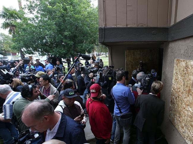 Dozens of members of the media stand in front of the home of shooting suspect Syed Farook in San Bernardino, California. Picture: Getty