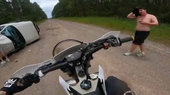 Bodycam vision of motorcycle riders arriving at ute rollover on Sunshine Coast