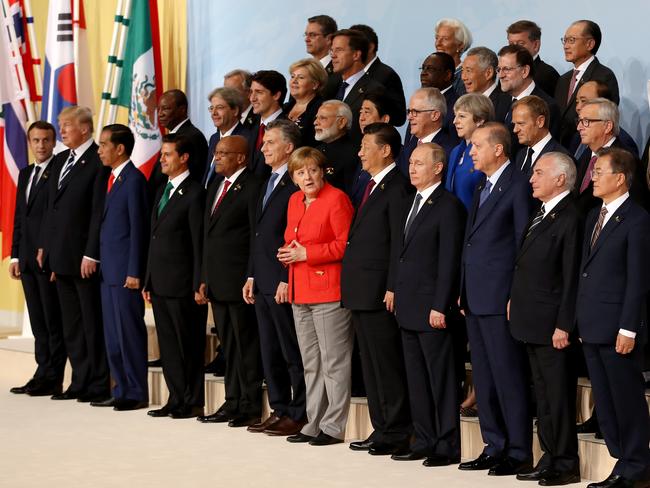 President Trump stands next to France’s Macron at the end of the picture, while Turkey, Russia and China’s leaders stand next to one another. Picture: Matt Cardy/Getty Images