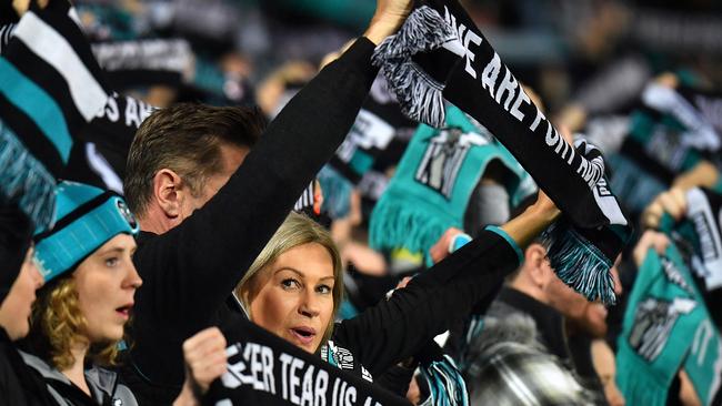 ADELAIDE, AUSTRALIA - SEPTEMBER 09:  Fans show their support during the AFL First Elimination Final match between Port Adelaide Power and West Coast Eagles at Adelaide Oval on September 9, 2017 in Adelaide, Australia.  (Photo by Daniel Kalisz/Getty Images)